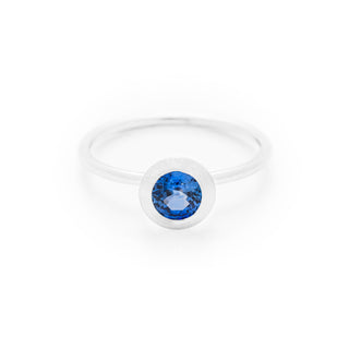 Blue sapphire dress ring made in 18ct white gold. From our flowers collection