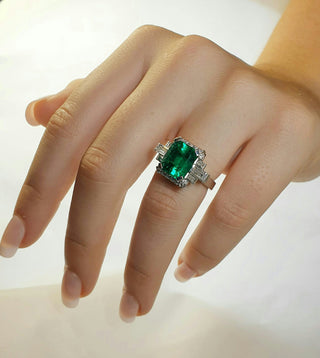 5.2ct Emerald ring hand shot
