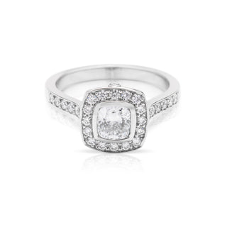 Cushion cut diamond and platinum engagement ring