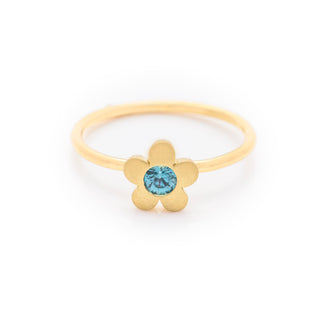 blue zircon dress ring made in 18ct yellow gold. From our flowers collection